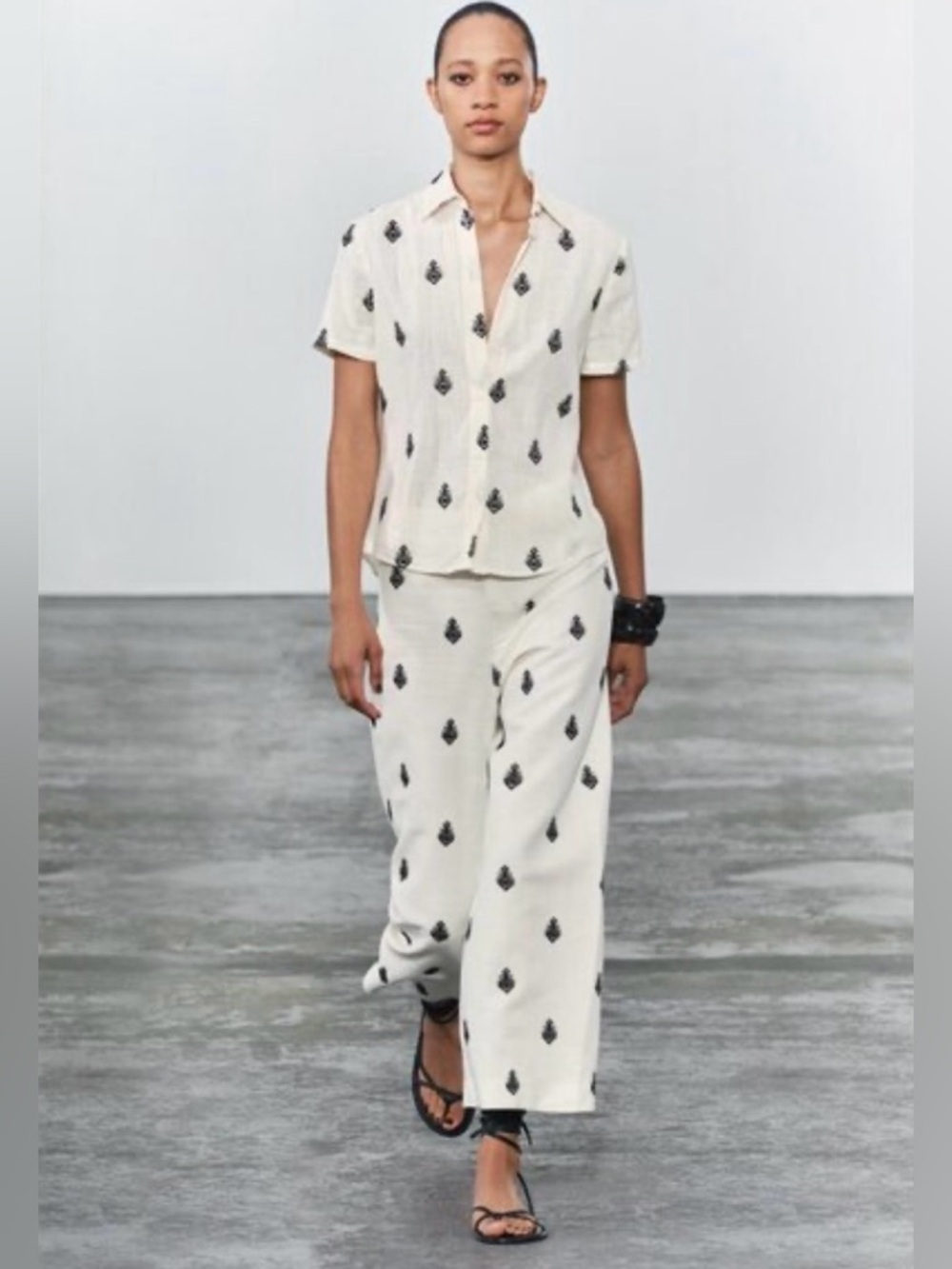 Cream linen pants with black embroidery